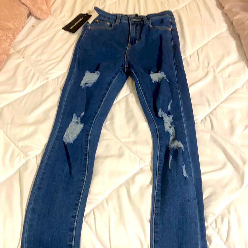 Mid blue distressed high waisted jeans